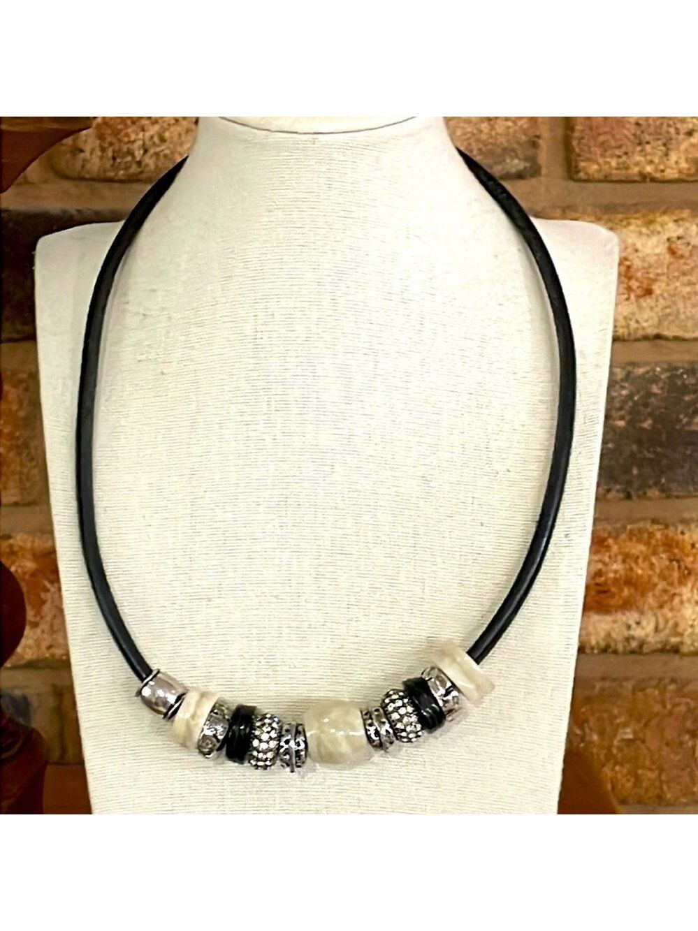 Vintage stone, metal and rhinestone beaded charms on black leather necklace